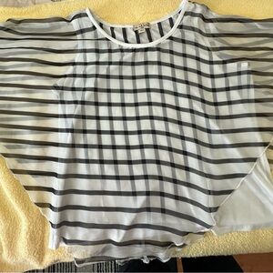 Women’s top.  Tank with an overlay.